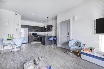 Wood-style plank flooring and plush carpeting
